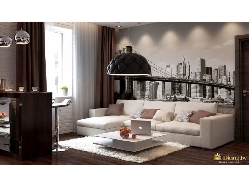 гостиная: шоколадные шторы, темный пол, светлый ковер, белый журнальный столик, светло-бежевый угловой диван. акцентная стена с изображением города и дизайнерский светильник